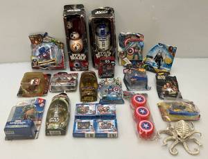 lot 14 image: Misc. Collectible Toys Including Star Wars & More Most New In Pack (Boxes Beat Up)