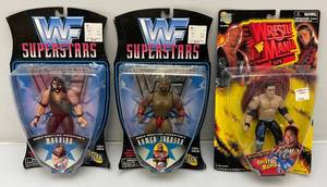 lot 25 image: Misc. Wrestling Action Figures Including Mankind And More (NEW IN PACK)