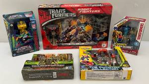 lot 57 image: Misc. Collectible TRANSFORMERS Action Figures (NIB)