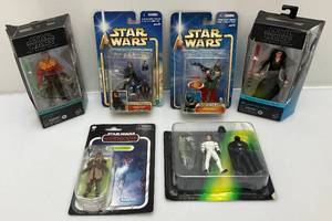 lot 62 image: Misc. STAR WARS Action Figures (NIP) Some Old Stock