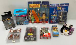 lot 85 image: Misc Collectible Action Figures Including Pocahontas, Pokemon  And More (NIB) Some Boxes Beat Up A Little
