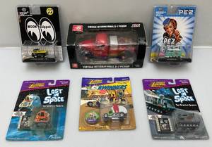 lot 95 image: Misc. Miniature Die-Cast Collectibles Including PEZ, Johnny Lightning Lost In Space And More (NOC)