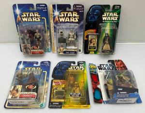 lot 111 image: Misc. STAR WARS Power Of The Force, Empire Strikes Back  Action Figures And More (NOC) One Bubble Yellowed