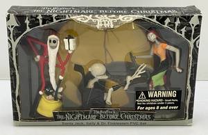 lot 141 image: Nightmare Before Christmas SANTA JACK, SALLY & DR FINKLESTEIN PVC Figure Set (NIB) Piece Loose In Box