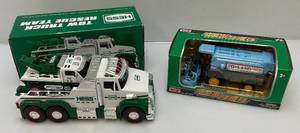 lot 149 image: Miniature Die-Cast Collectible Trucks Including HESS Tow Truck Rescue Team Electronic Sounds And Lights & Farm Series Combine (Both New In Box)