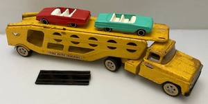 lot 181 image: 1950s-60s Pressed Steel Tonka Motor Transport With Ramp & Two Original Plastic Cars (Tops Broke Off)