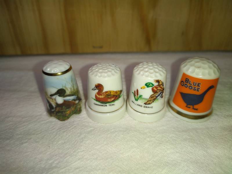lot 76 image: Waldenburg Duck, MSR Goose and Two Duck Thimbles