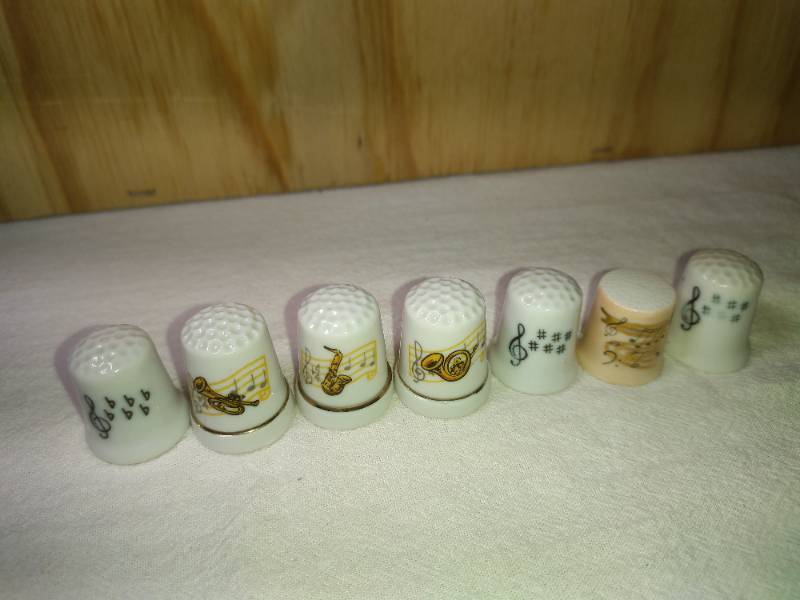 lot 92 image: 7 Ceramic Music Themed Thimbles