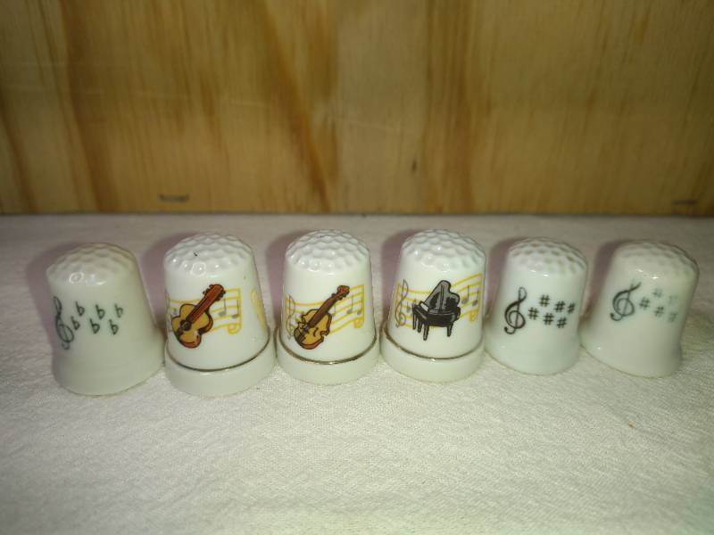 lot 93 image: 6 Ceramic Music Themed Thimbles