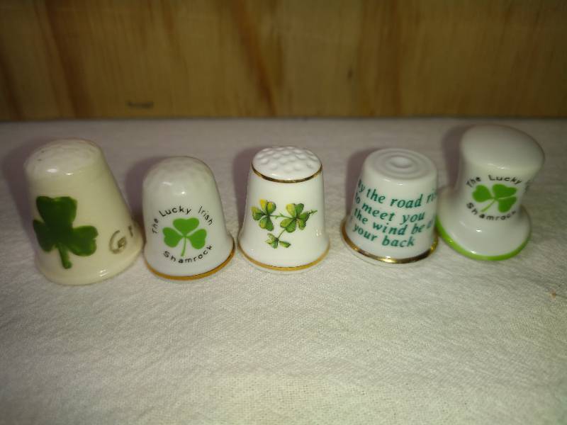 lot 94 image: 5 Irish Themed Thimbles One is made by Royal Tara Ireland