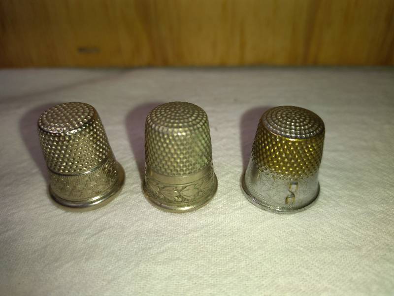 lot 159 image: 1 Simmons Nickel Silver , 1 Ornate, and 1 Thread Cutter Thimbles