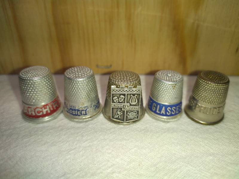 lot 188 image: 5 Assorted Advertising Metal Thimbles