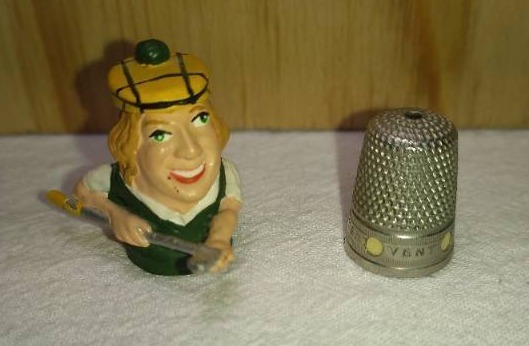 lot 203 image: Pewter Painted Golfer with Hinged Hat and ILES Nickel Ventilated Thimbles