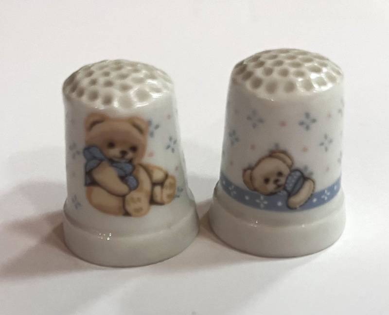 lot 53 image: Two Teddy Bear Thimbles