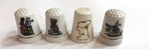 lot 240 image: 4 Rabbit Thimbles