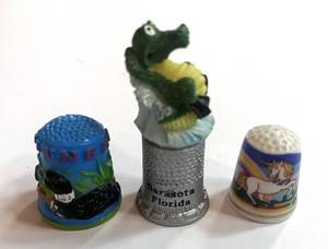 lot 239 image: Unicorn, Alligator and Loon Thimbles