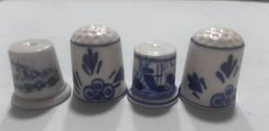 lot 129 image: 4 Blue Delft Thimbles