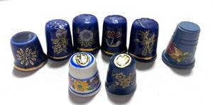 lot 180 image: 8 Blue Thimbles with Flowers