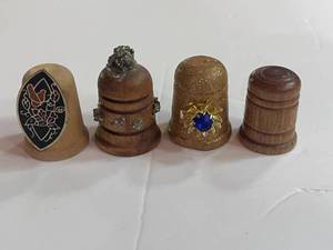 lot 111 image: 4 Painted and Embellished Wooden Thimbles