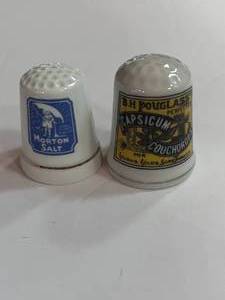 lot 25 image: Capsicum Couchdrops and Morton Salt Advertising Thimbles