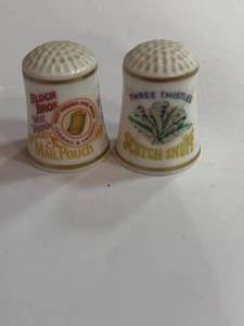 lot 21 image: Mail Pouch Tobacco and Scotch Snuff Advertising Thimbles
