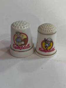 lot 23 image: 2 Campbells Soup Advertising Thimbles