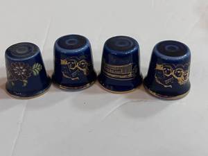 lot 72 image: 4 Blue Souvenir Thimbles South Dakota and Las Vegas