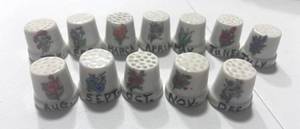 lot 44 image: 12 Flowers of the Month Ceramic Thimbles