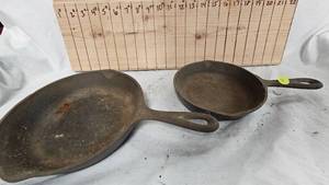 lot 31 image: No 3 and No 5 Cast Iron Pans-Pair