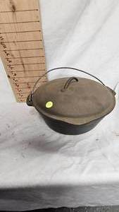 lot 33 image: Cast Iron Pot with Lid-Made in USA