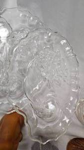lot 23 image: Lot includes Pair of Chicken Figures, Care Bear Glass, 4 Relish Dishes and Punch Cups