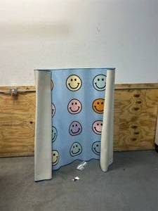 lot 72 image: Pastel Rainbow Smiley Face Seating Rug