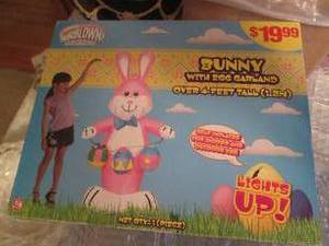 lot 22 image: New in box 4ft light up Inflatable ...
