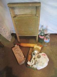 lot 123 image: Vintage Pepsi and Coca-Cola 32oz bo...