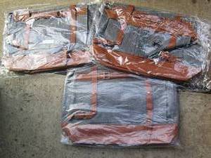 lot 126 image: Denim and Leather inspired messenge...