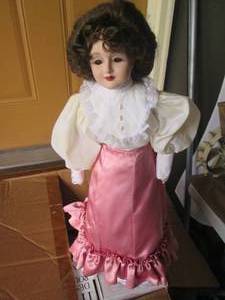 lot 128 image: Vintage porcelain doll with stand...