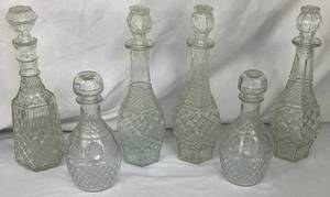 lot 41 image: Collection of MCM Barware Liquor Decanters - 2 Anchor Hocking, 4 Wexford, and 1 Princess House