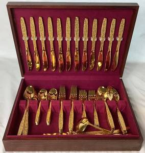 lot 49 image: Goldtone Silverware Set by Rogers Cutlery Co. IS - Golden Spring Garden Pattern