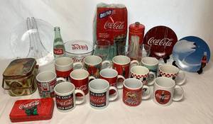 lot 102 image: Large Assortment of Vintage Coca-Cola Collectable Items - Includes, Glassware, Plates, Tins, Cofee Mugs, Bottle, Dixie Cups, Straw Holder, Bowl, Magnet - 26 Items Total