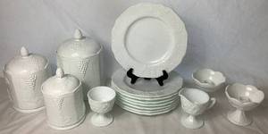 lot 131 image: Vintage Harvest Grape Milk Glass Collection - Includes Set of 3 Lidded Canisters, 2 Candle Holders, Cream & Sugar, 8- 9.75 Dinner Plates