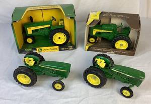 lot 81 image: Collection of 116 Scale John Deere Die Cast Utility Tractors - (2) 584, 630, 730