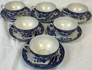 lot 142 image: Porcelain Vintage Occupied Japan Dark Blue and White Sakura Blossom Pattern Teacups(6) and Saucers(7)