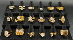 lot 234 image: Selection of Gold Tone Rings Size 9-9.5