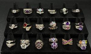 lot 235 image: Bundle of 32 Silver Tone Rings Sizes 9-9.5