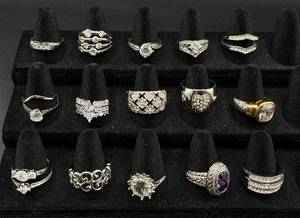 lot 237 image: 17 Silver Tone Rings Size 9.5-10.5