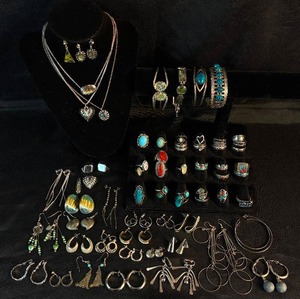 lot 298 image: Large Assortment of Silver Tone Bracelets, Earrings and Rings
