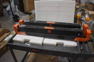 lot 77 image: WEN WA1302 1300-Pound Capacity Height Adjustable Folding Steel Saw Horse with 2x4 Support Arms, Two Pack