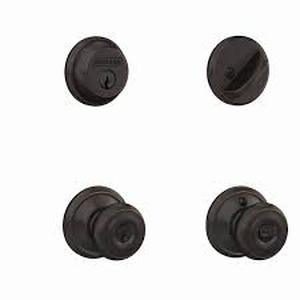 lot 27 image: Lot of Schlage Georgian Aged Bronze Single Cylinder Deadbolt and Keyed Entry Door Knob Combo Pack  Customer Returns See Pictures