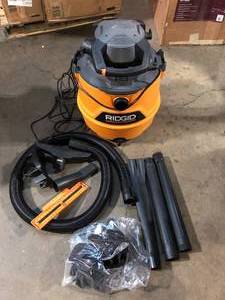 lot 51 image: RIDGID 16 Gal. 6.5 Peak HP NXT Shop Vacuum with Blower, Filter, Hose,( Bags Not Included )  Customer Returns See Pictures   Customer Returns See Pictures