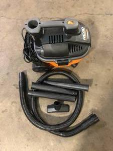 lot 4 image: RIDGID 4 Gal. 5.0 Peak HP Portable Shop Vacuum Wet Dry Vac with Fine Dust Filter, Locking Hose and Attachments WD4070  Customer Returns See Pictures